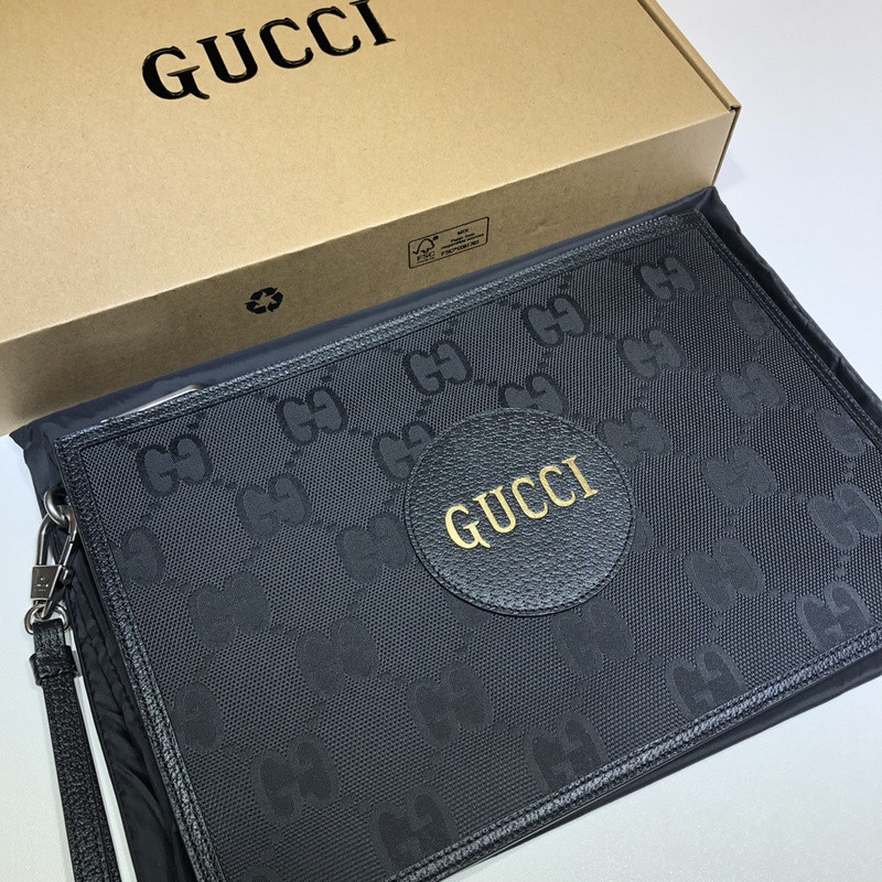 G*u*i clutch bag