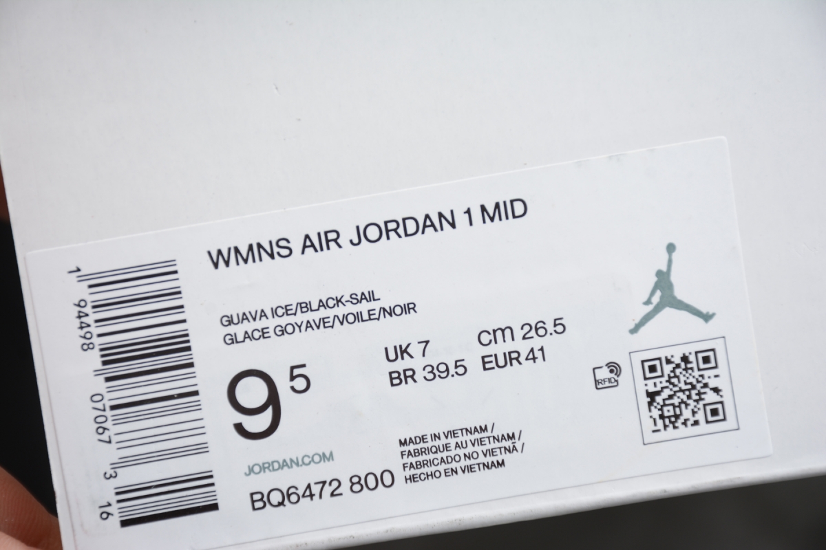 Jordan 1 Mid Barely Orange
