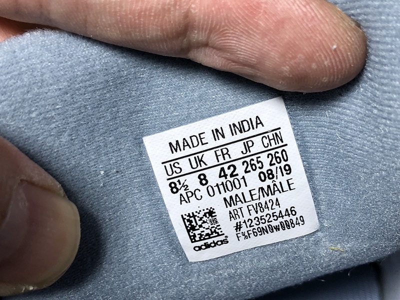 ad*s Y**zy boost 700 v2 hospital blue